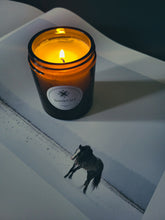 Load image into Gallery viewer, Candle lit with horse in foreground galloping through snow