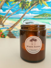 Load image into Gallery viewer, candle with tropical scene behind
