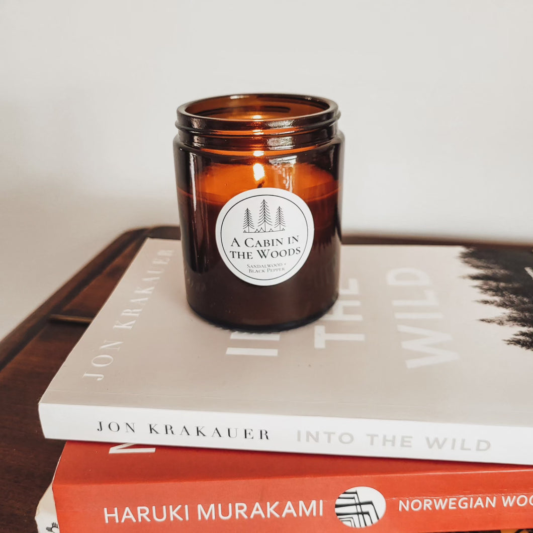 Candle sitting on books